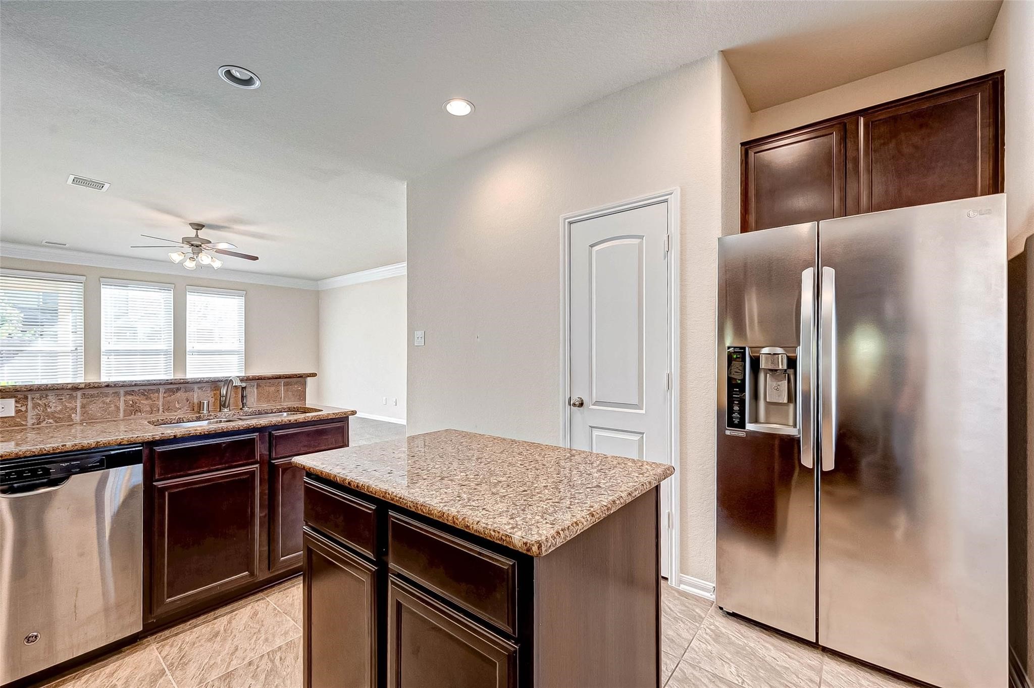 3322 Coopers Ridge Way Houston, TX 77084 - Photo 10 of 41 Bright kitchen featuring generous counter space.