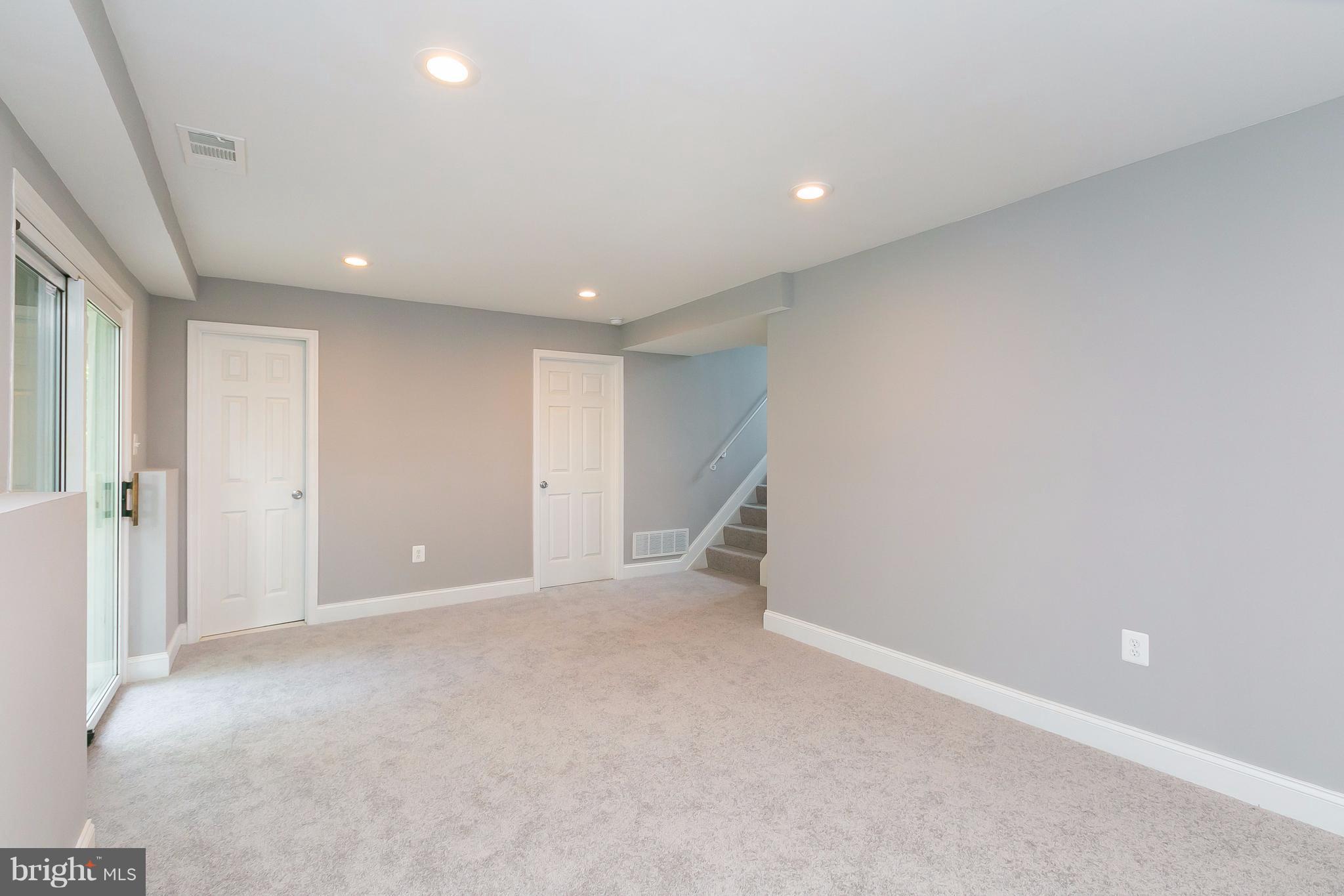 8621 Pilsen Road Randallstown, MD 21133 - Photo 20 of 26 a view of an empty room with a window