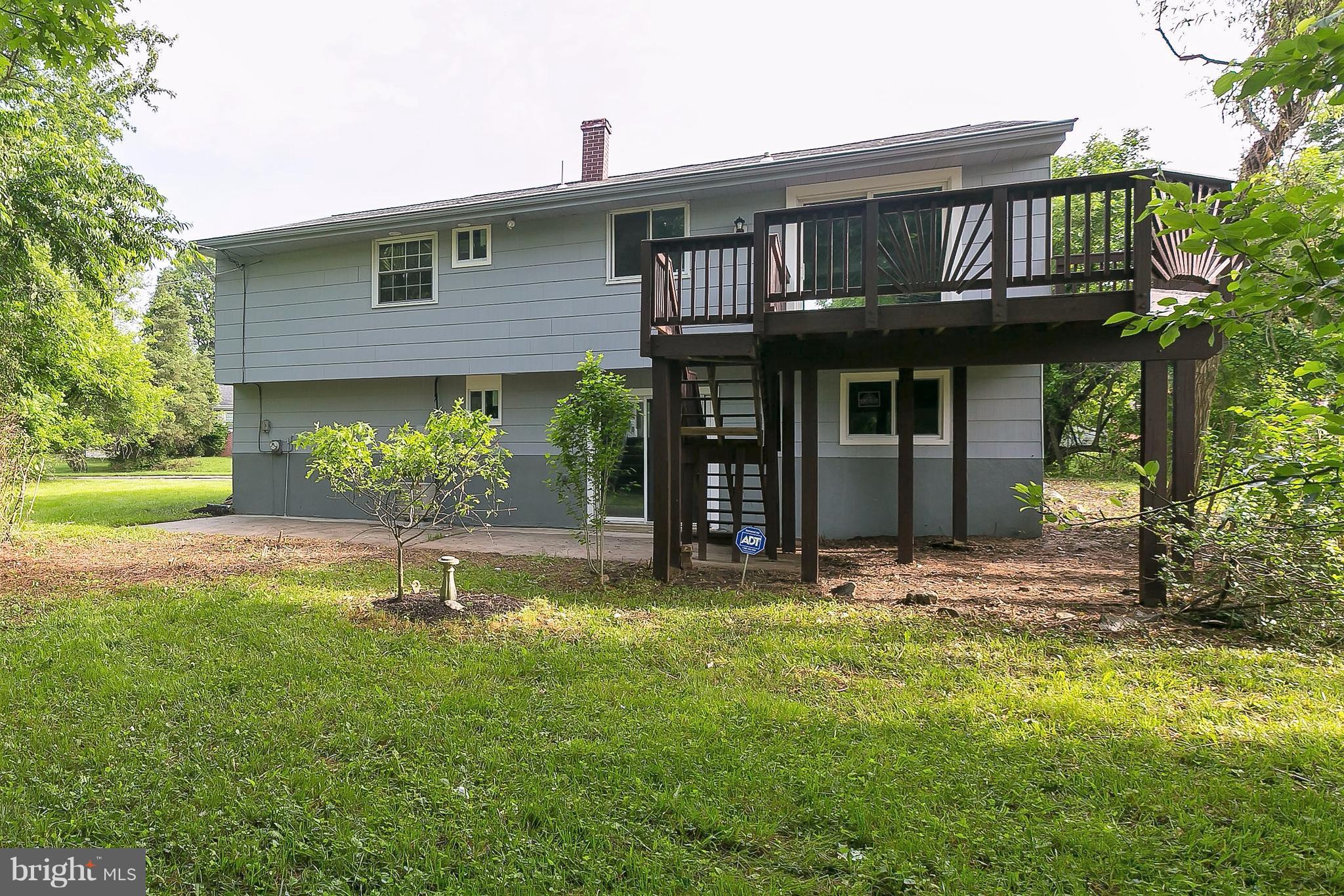 8621 Pilsen Road Randallstown, MD 21133 - Photo 23 of 26 a view of a house with a yard and plants