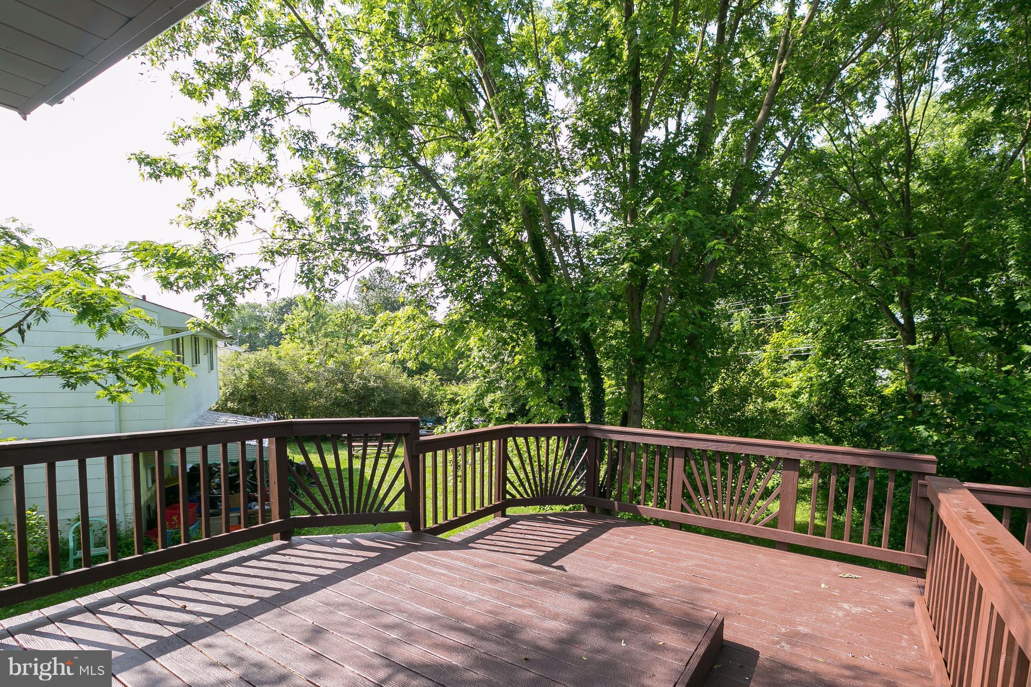 8621 Pilsen Road Randallstown, MD 21133 - Photo 24 of 26 a view of a wooden roof deck