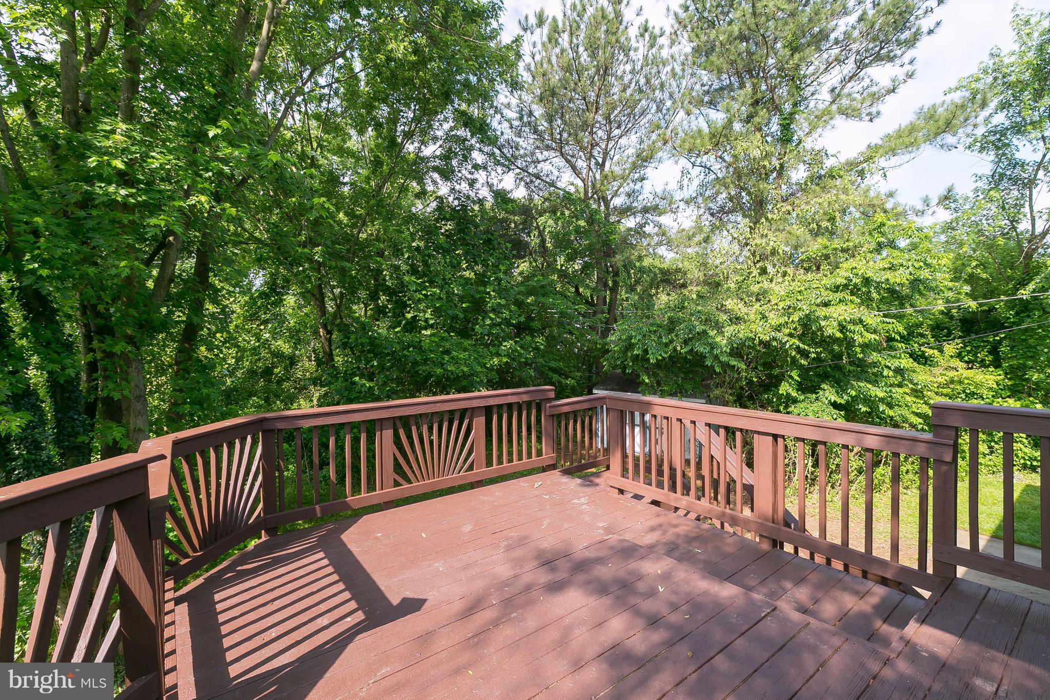 8621 Pilsen Road Randallstown, MD 21133 - Photo 25 of 26 a view of balcony with wooden floor and fence