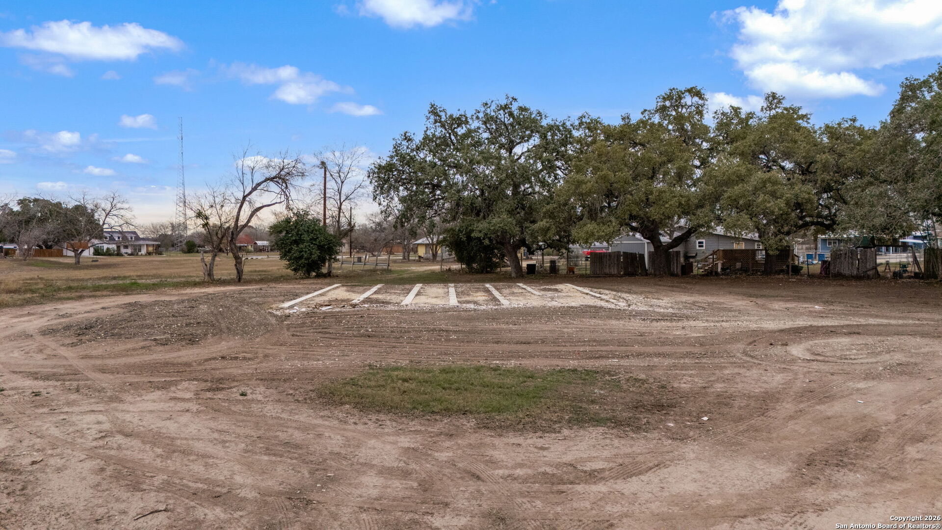Tbd Medina LaCoste, TX 78039 - Photo 11 of 13 a view of dirt yard with a large tree