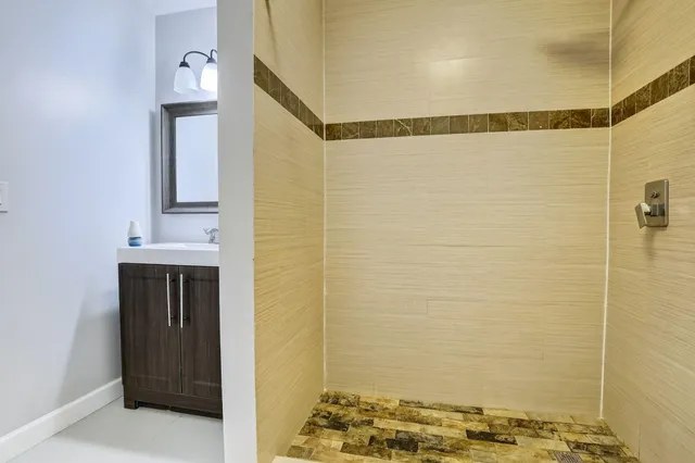 a view of a bathroom with a glass door