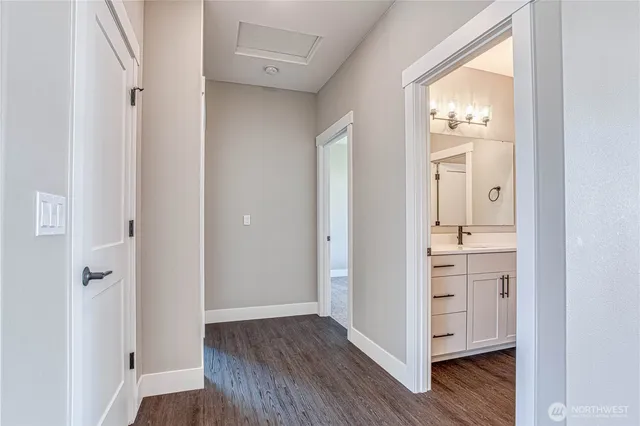 a view of bathroom with a wooden floor