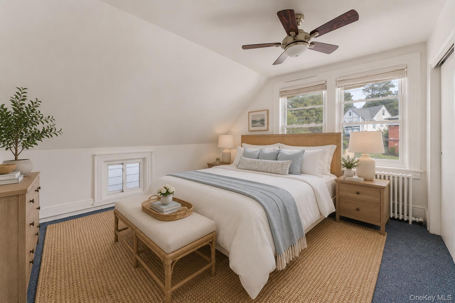 355 Bronxville Road Bronxville, NY 10708 - Photo 14 of 22 a bedroom with a bed and a table