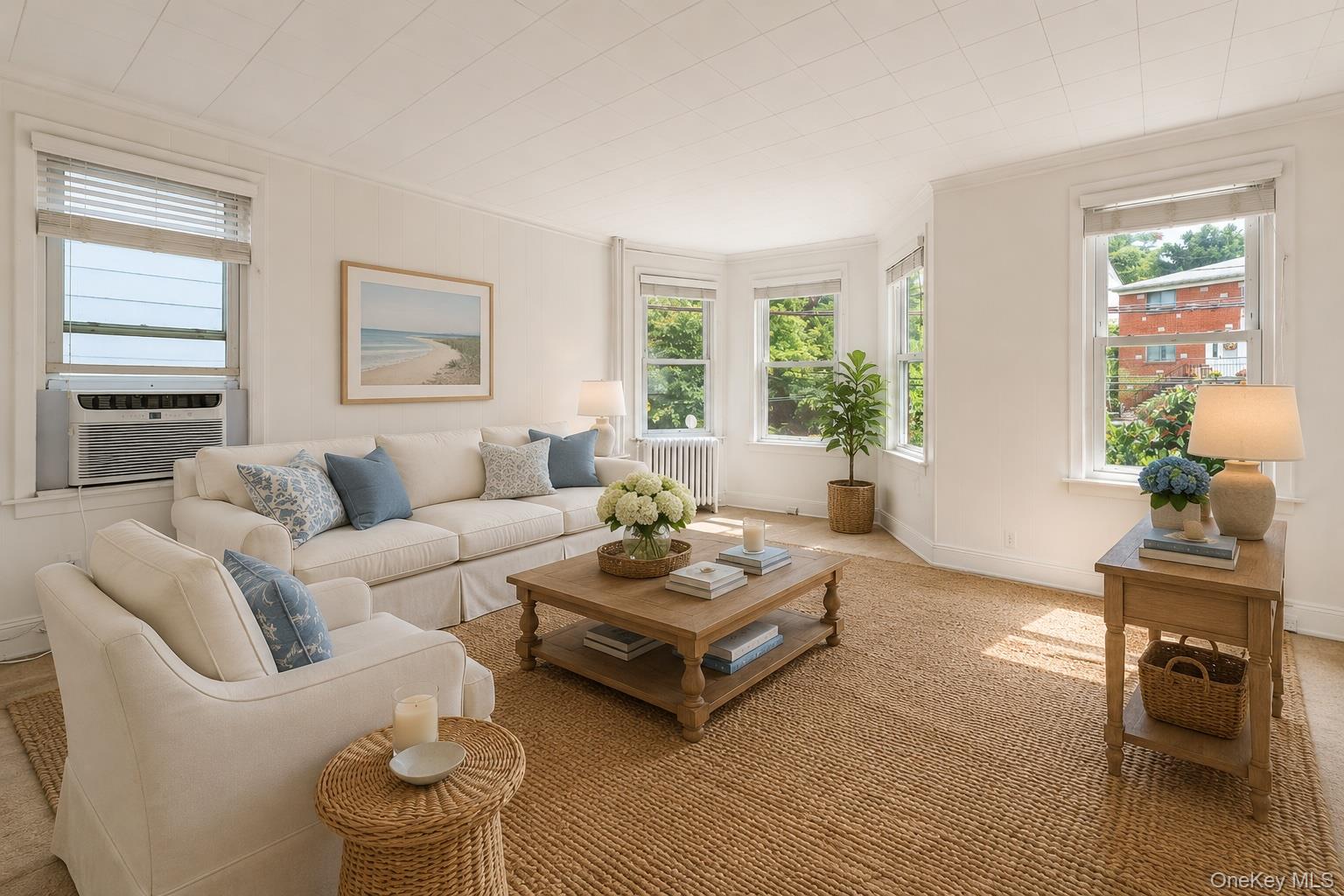 355 Bronxville Road Bronxville, NY 10708 - Photo 4 of 22 a living room with furniture and a window