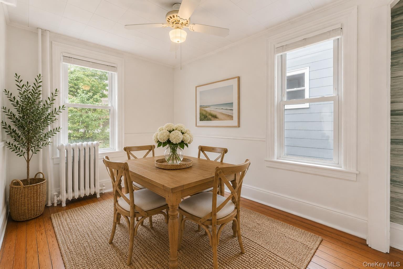 355 Bronxville Road Bronxville, NY 10708 - Photo 7 of 22 a view of a dining room with furniture and wooden floor
