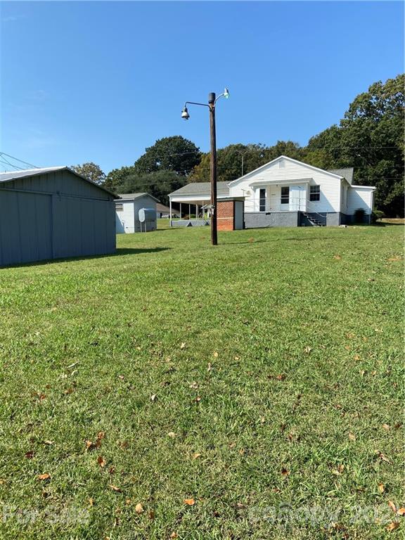 883 State Rd S-29-376 Lancaster, SC 29720 - Photo 3 of 16 a house view with a garden space