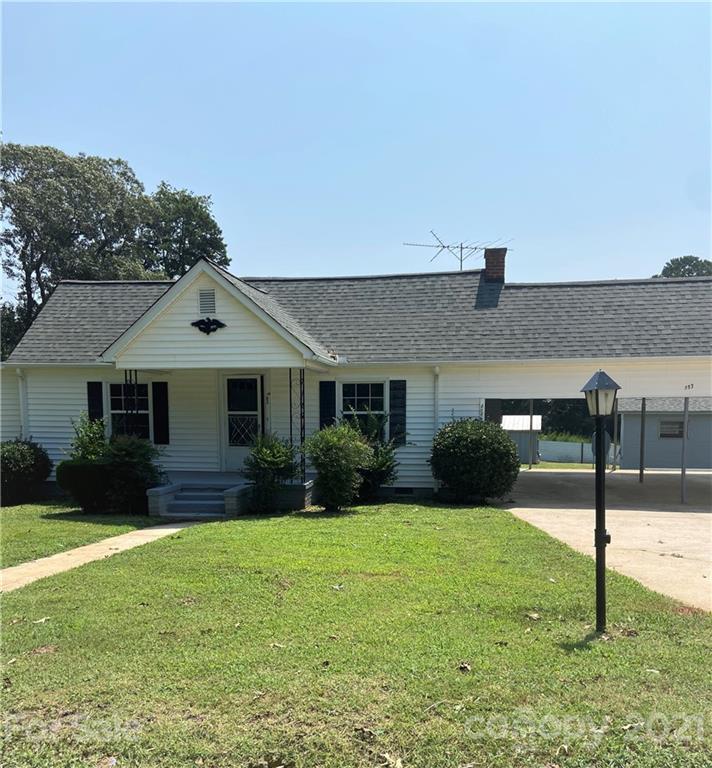 883 State Rd S-29-376 Lancaster, SC 29720 - Photo 4 of 16 a front view of a house with garden