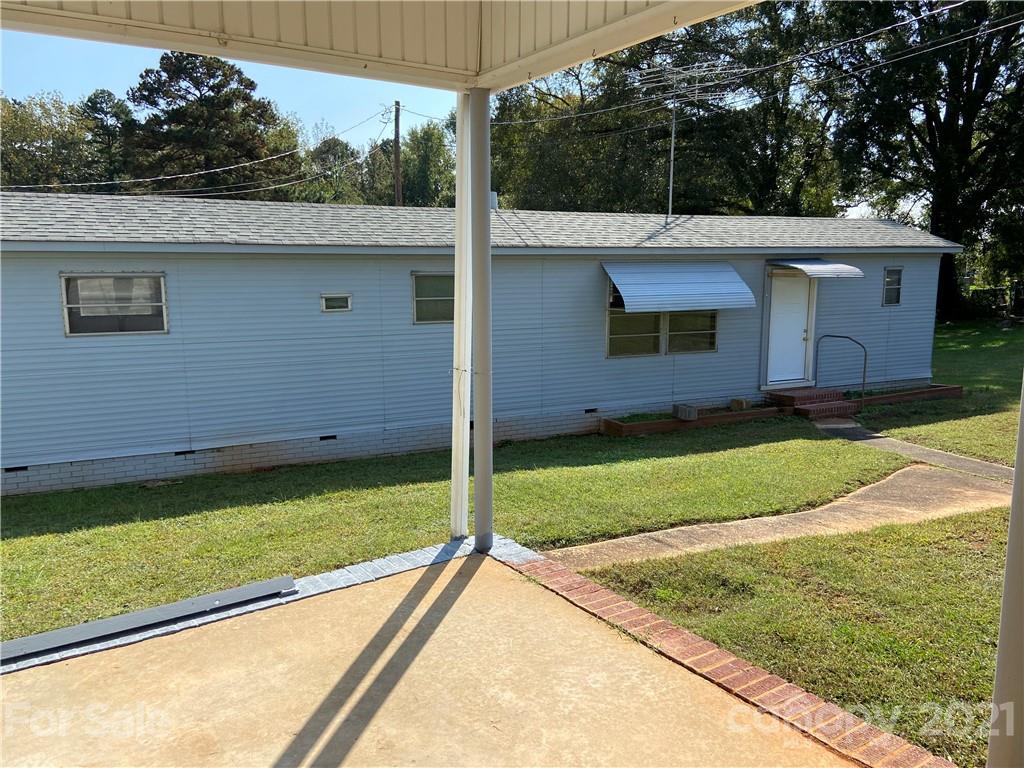 883 State Rd S-29-376 Lancaster, SC 29720 - Photo 5 of 16 a view of a backyard with a cabin