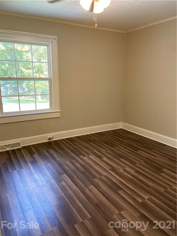 883 State Rd S-29-376 Lancaster, SC 29720 - Photo 9 of 16 a view of a room with wooden floor and a window