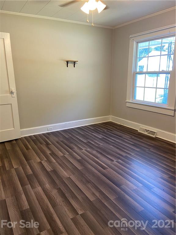883 State Rd S-29-376 Lancaster, SC 29720 - Photo 10 of 16 an empty room with wooden floor and windows