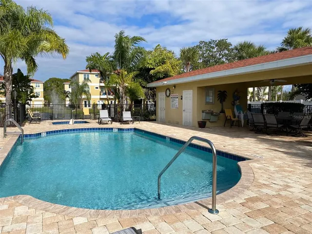 a view of a house with a swimming pool