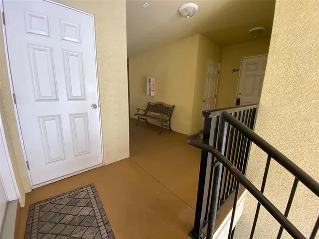 a view of a room with wooden walls