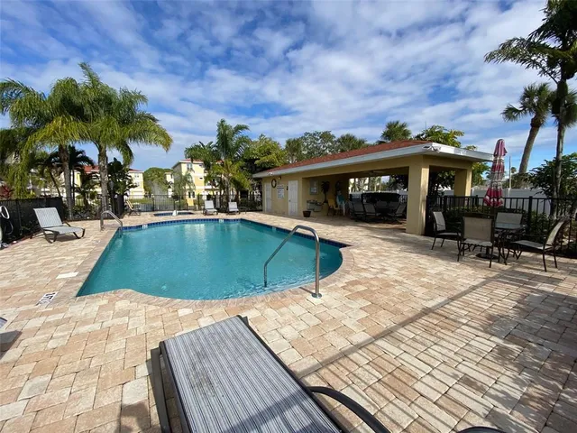 a view of a park with seating space