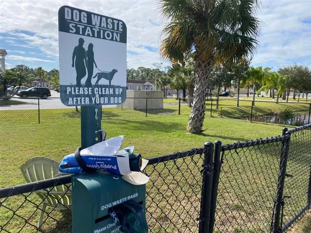 an aerial view of residential houses with outdoor space and swimming pool