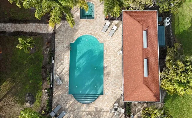 a view of a lake with outside of house