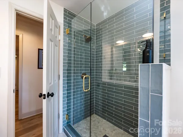 a close view of a sink and a table in a room