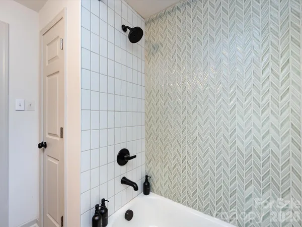 a bathroom with a sink toilet and vanity