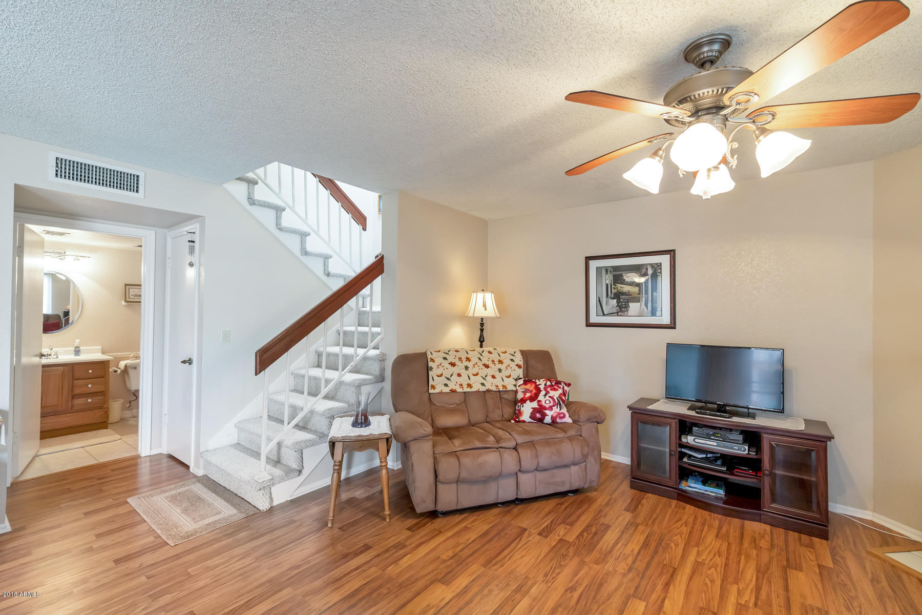 2834 South Ext Road, Unit 1050 Mesa, AZ 85210 - Photo 4 of 14 Open stairway with skylight