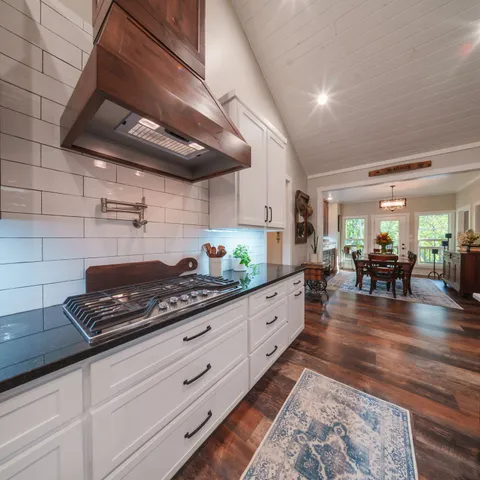 a view of a hallway with a furniture