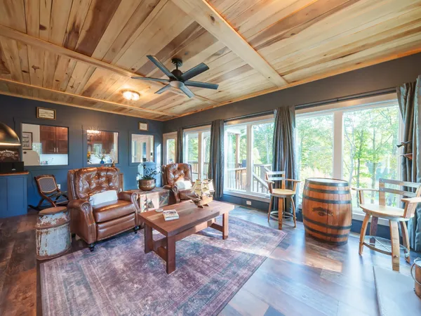 a view of a balcony with chairs