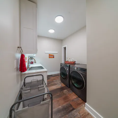 a view of a balcony with floor to ceiling windows and wooden floor
