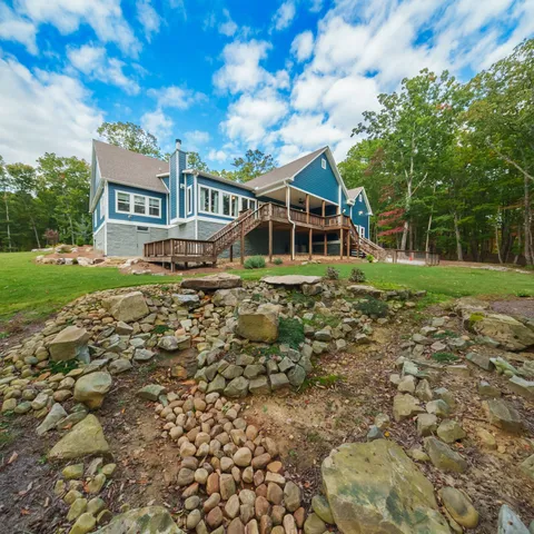 a view of a lake with a big yard