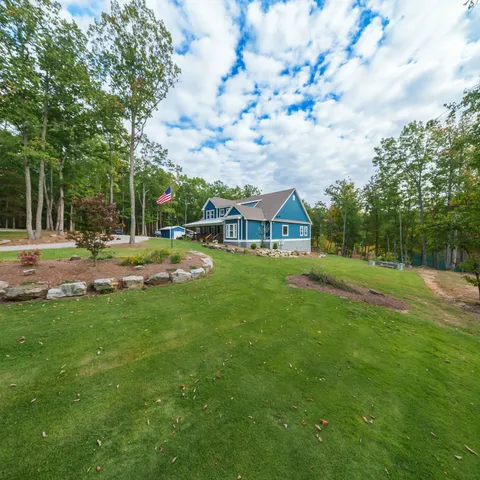 a childrens park with lots of swings and slides