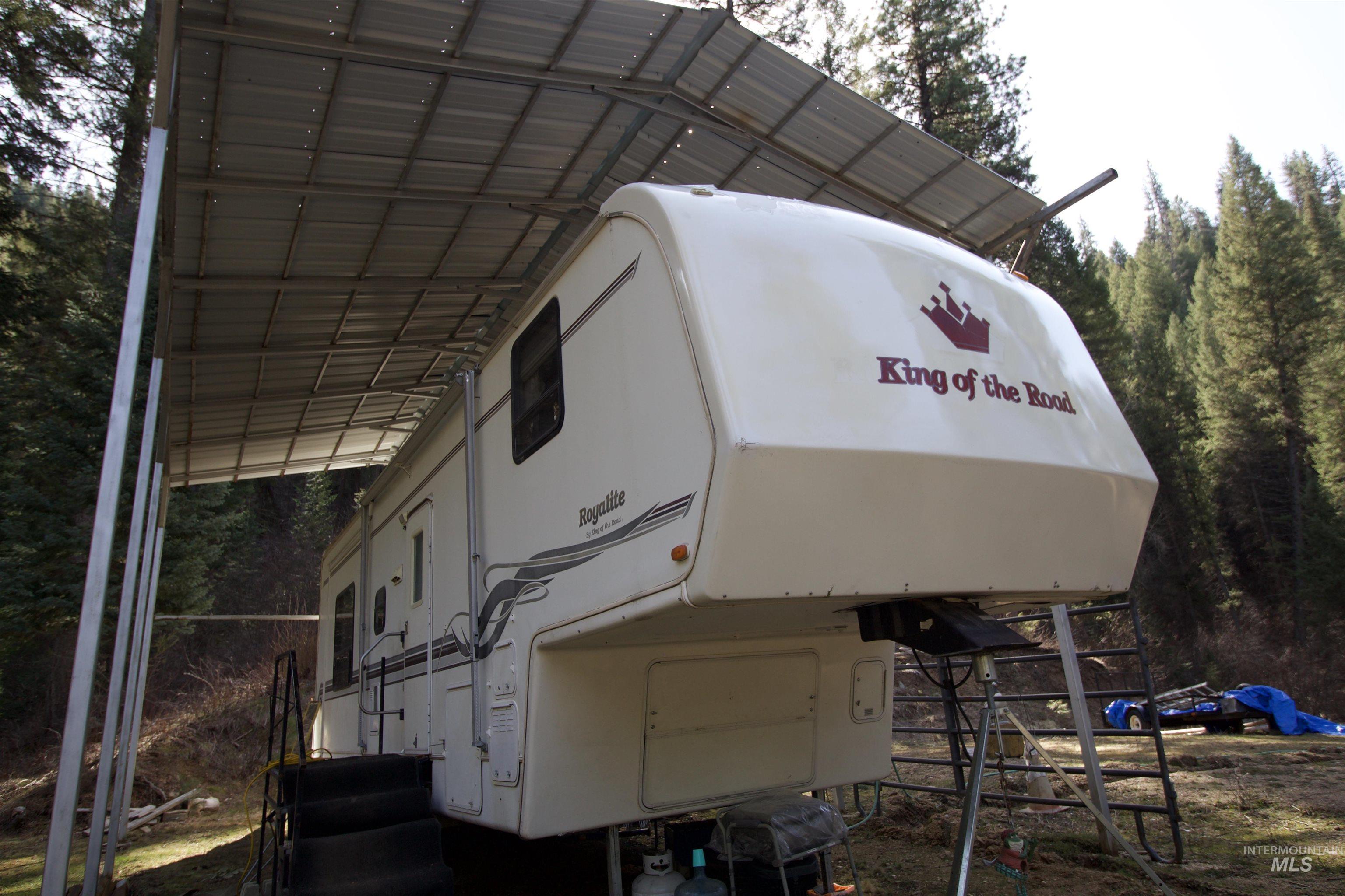 36 Lightning Creek Road Garden Valley, ID 83622 - Photo 3 of 12 View of parking featuring a carport