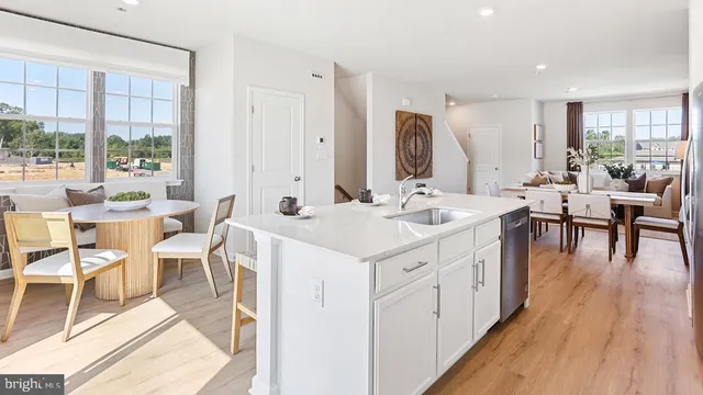 a bedroom with a bed and a mirror