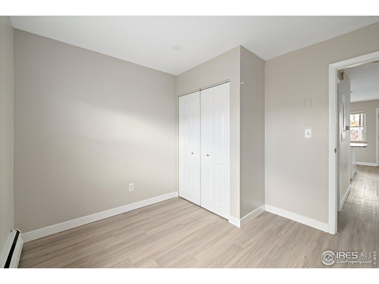 1938 Spruce Street Boulder, CO 80302 - Photo 25 of 50 a view of an empty room and wooden floor
