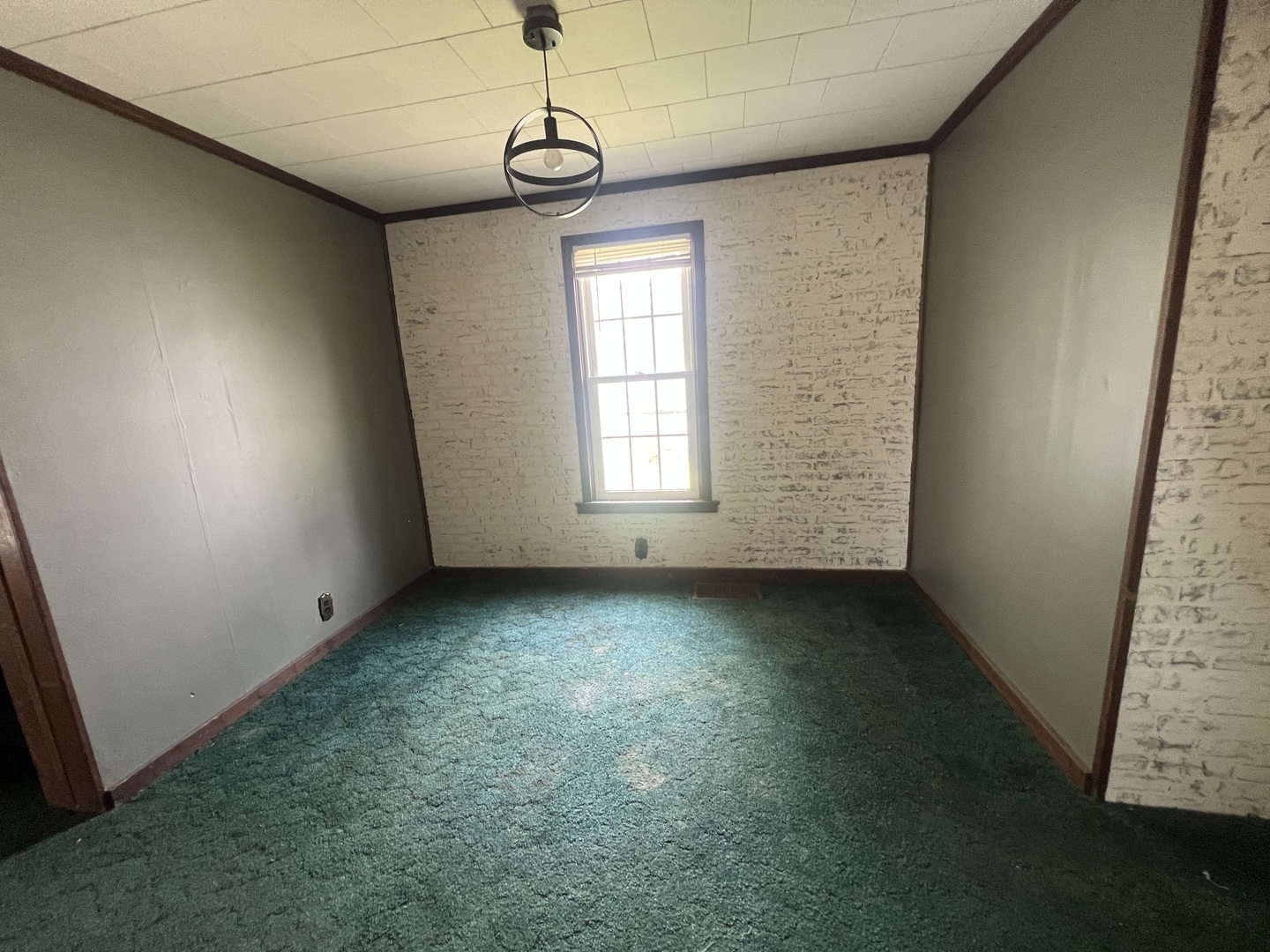 529 North 2nd Street Watseka, IL 60970 - Photo 8 of 16 a view of a livingroom with a window