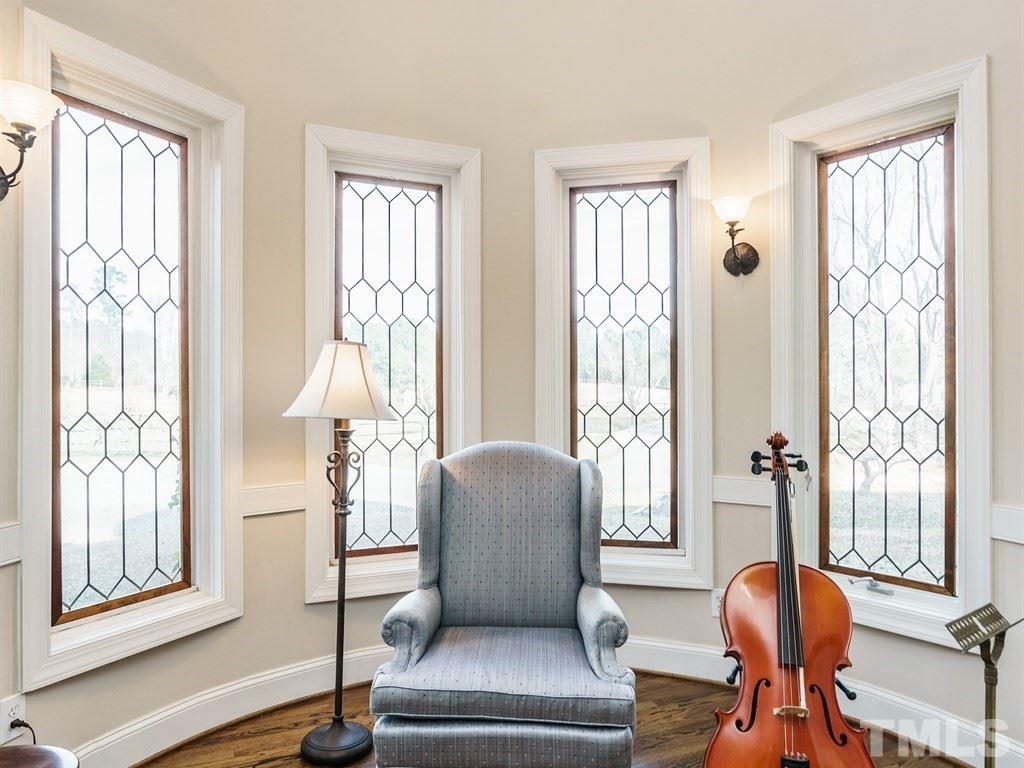 Charming turret room off the living room. Great place for reading, music room, or relaxing.