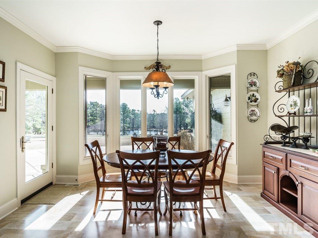 2125 Olive Chapel Road Apex, NC 27502 - Photo 10 of 25 Breakfast room has great view of the back pond, as do the family room and den.