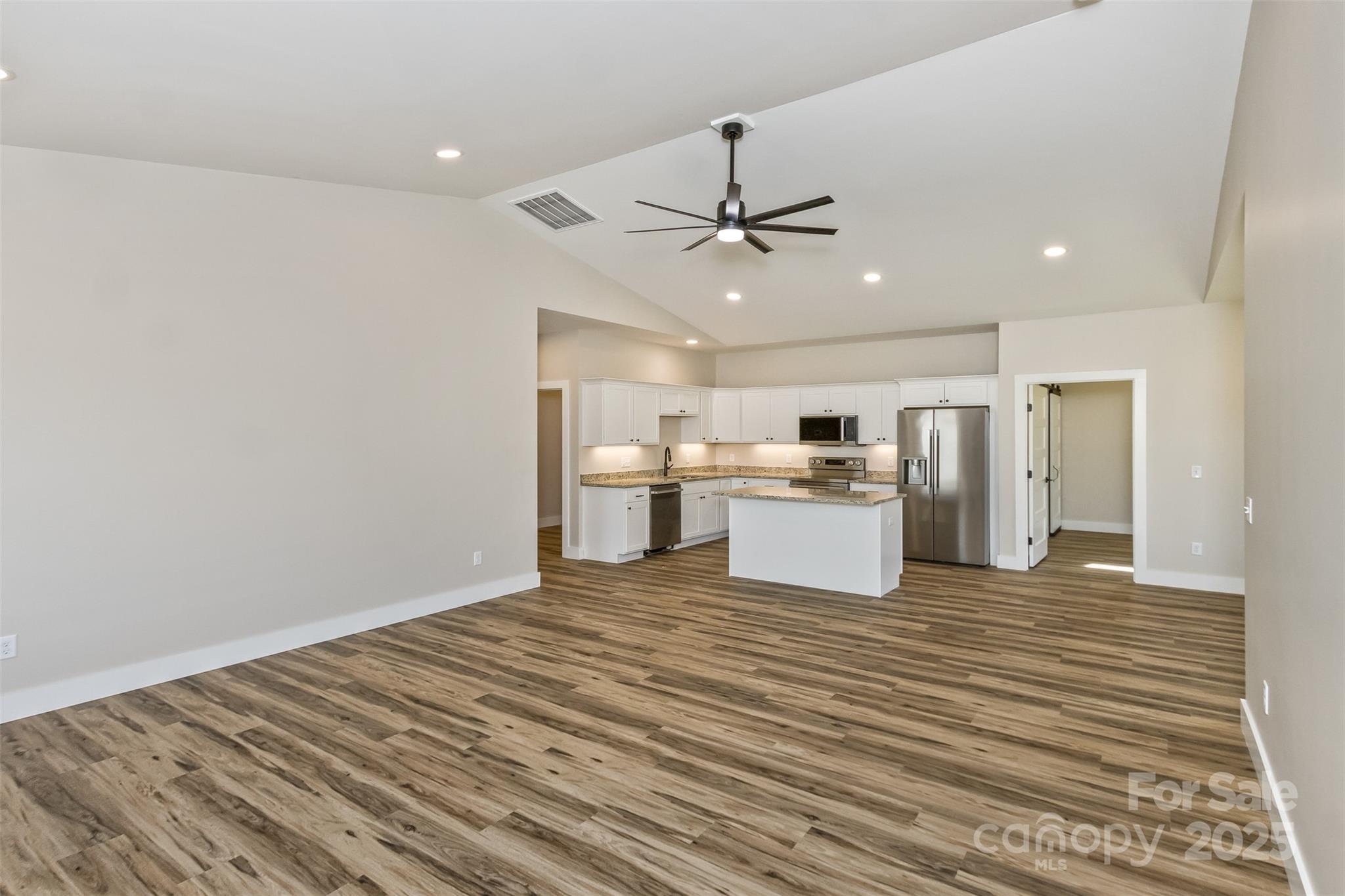 115 Peyton Elaine Road Clyde, NC 28721 - Photo 13 of 37 a view of kitchen with wooden floor