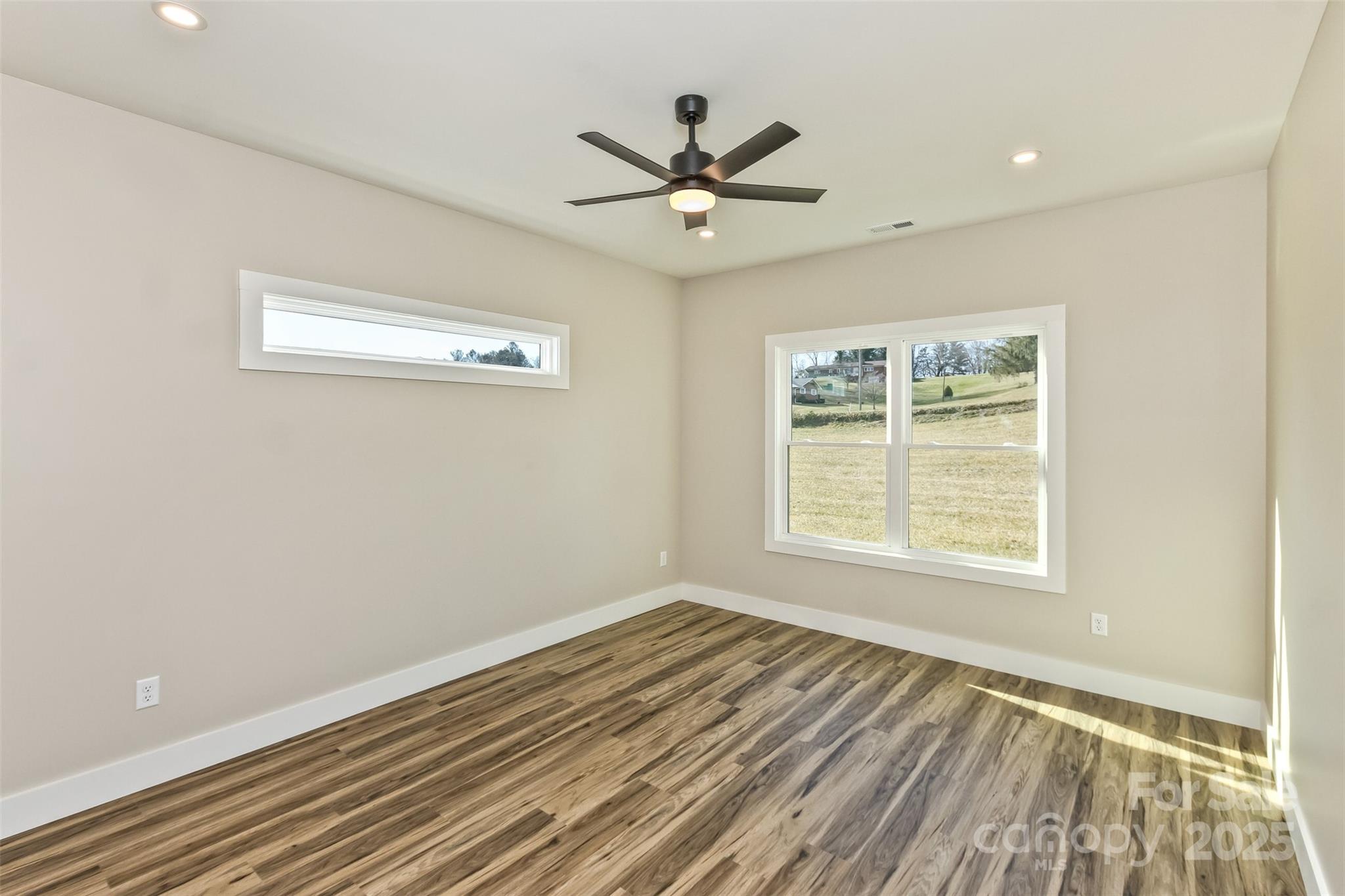 115 Peyton Elaine Road Clyde, NC 28721 - Photo 17 of 37 a view of an empty room with a window