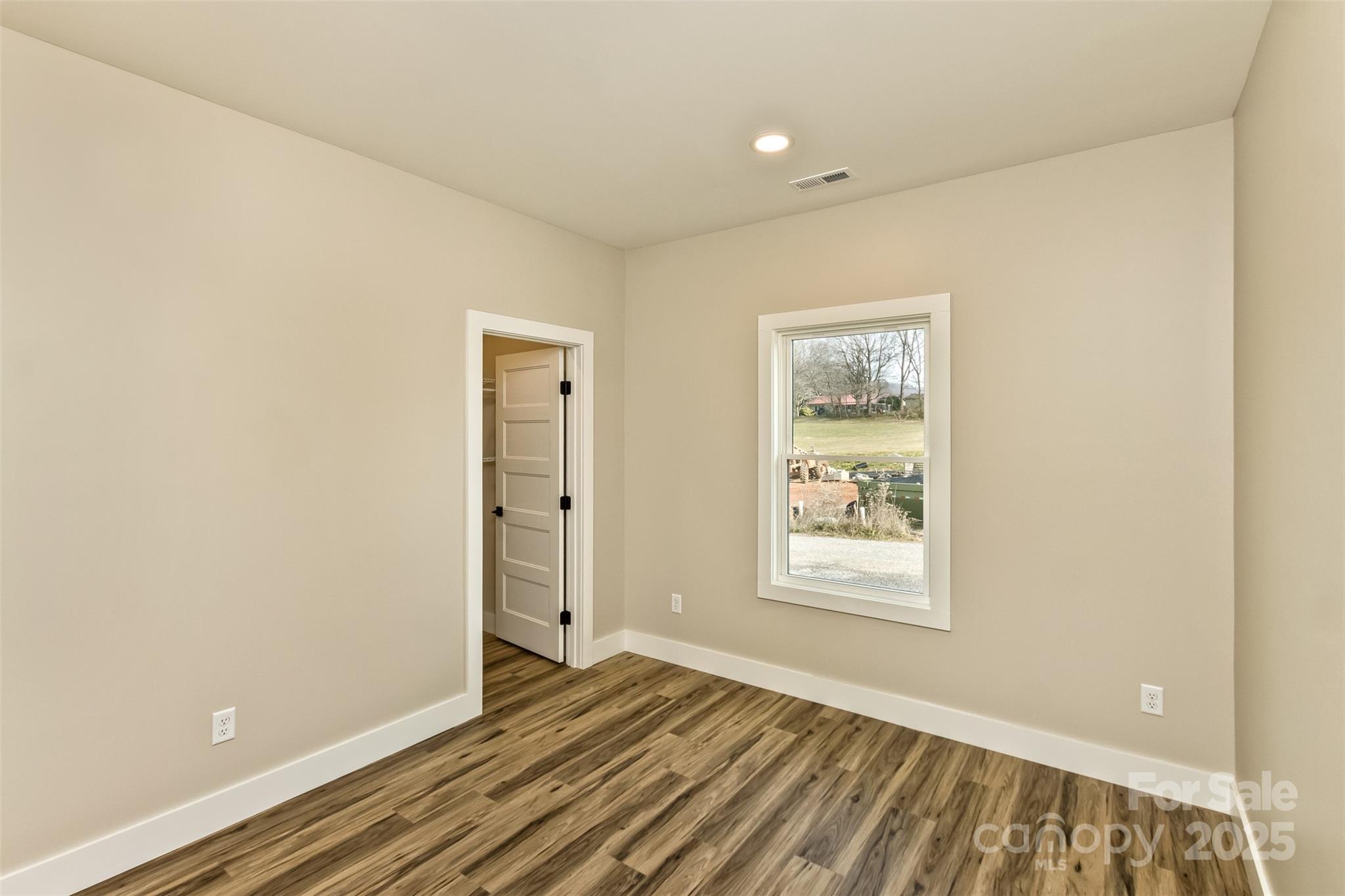 115 Peyton Elaine Road Clyde, NC 28721 - Photo 25 of 37 a view of an empty room and window