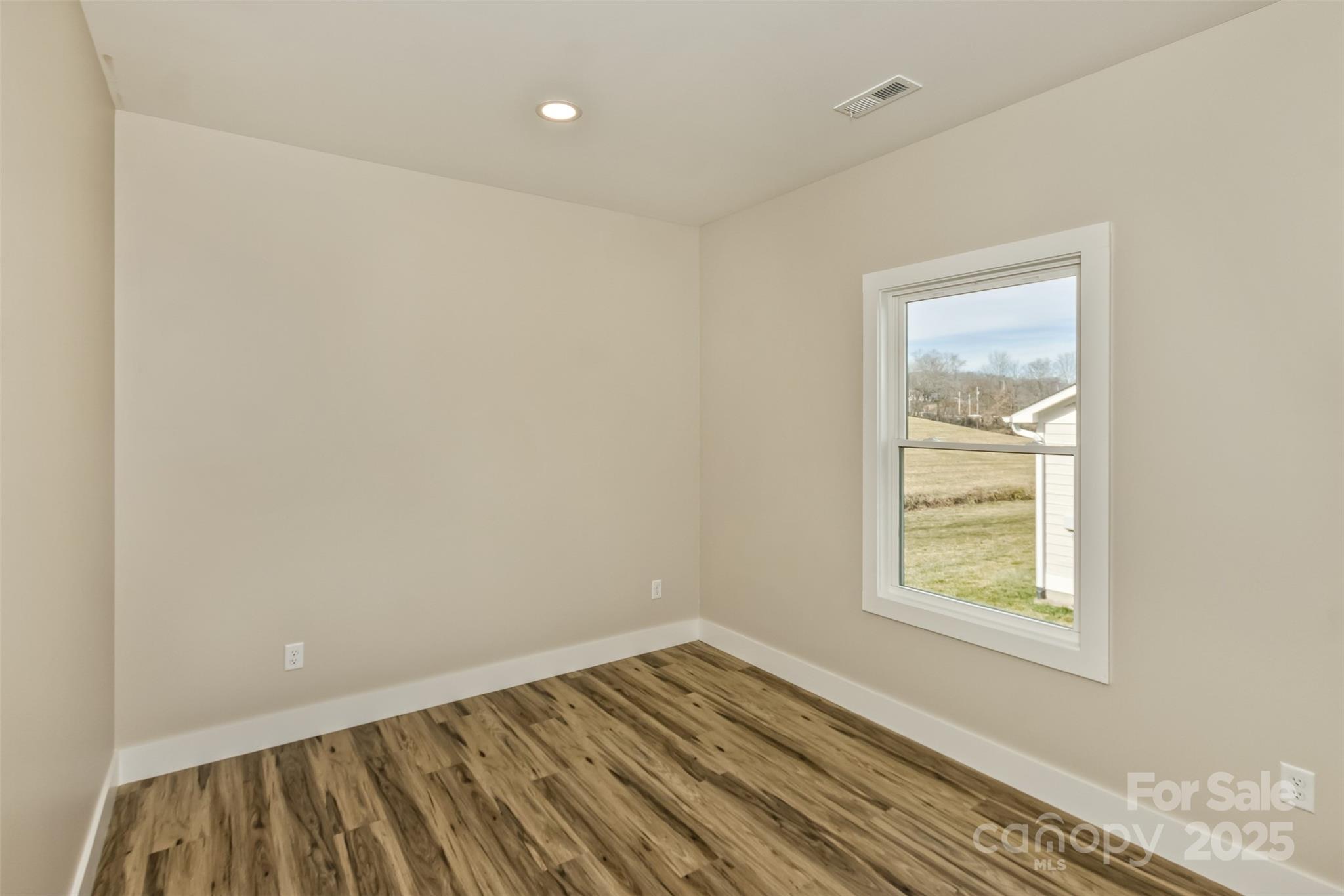 115 Peyton Elaine Road Clyde, NC 28721 - Photo 27 of 37 an empty room with a window