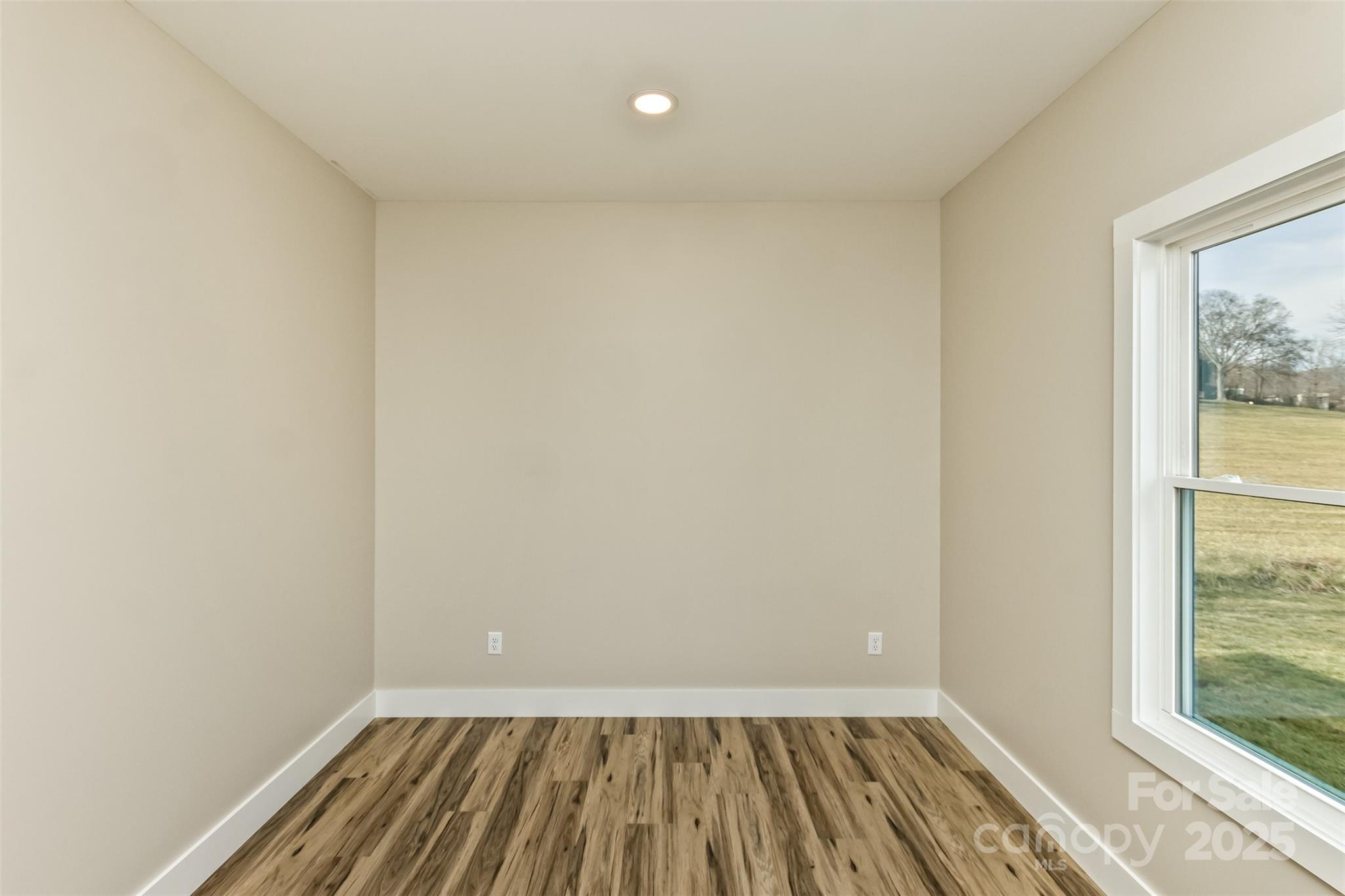 115 Peyton Elaine Road Clyde, NC 28721 - Photo 28 of 37 a view of a room with wooden floor and small window