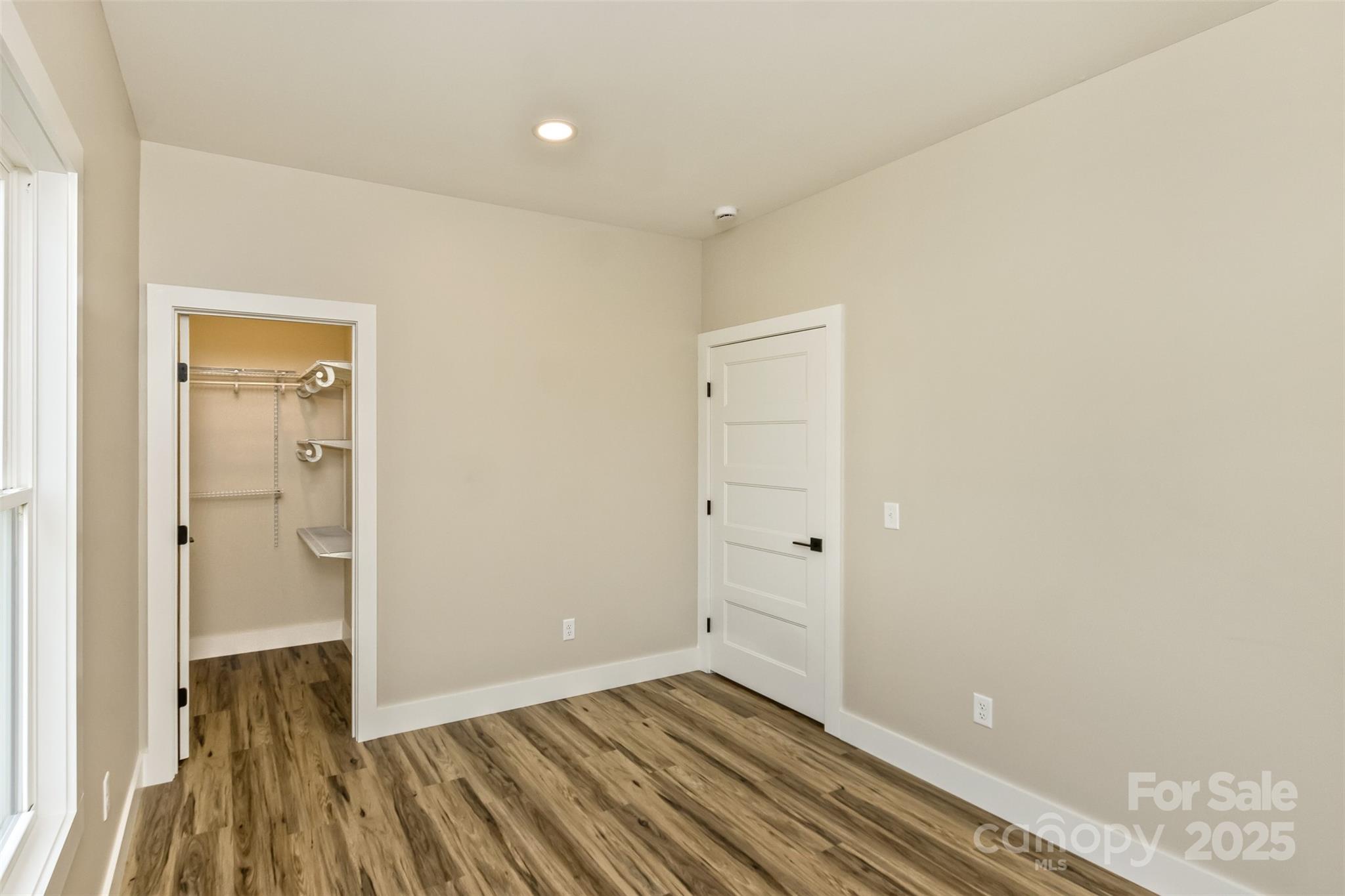 115 Peyton Elaine Road Clyde, NC 28721 - Photo 29 of 37 a view of a room with wooden floor and a bathroom