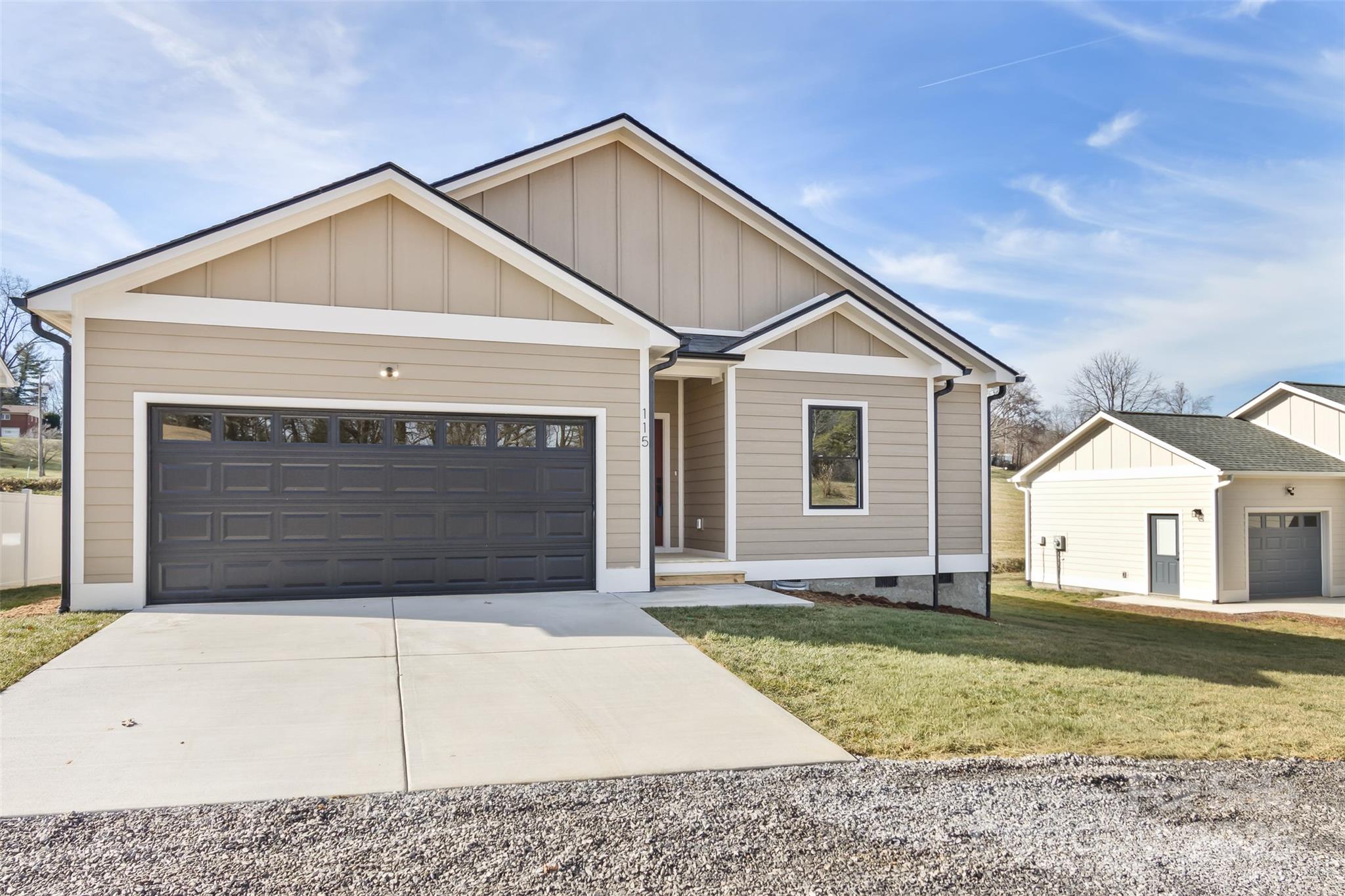 115 Peyton Elaine Road Clyde, NC 28721 - Photo 3 of 37 a front view of a house with garage