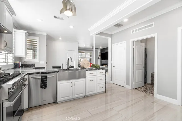 a bathroom with a sink a mirror and a shower