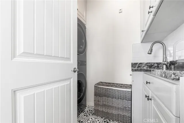 a white toilet sitting next to a bath tub