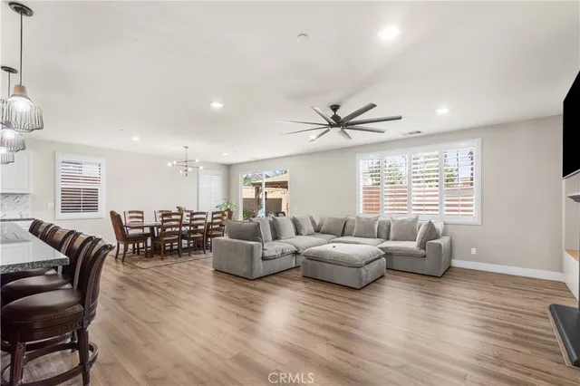a kitchen with stainless steel appliances granite countertop a sink stove and microwave