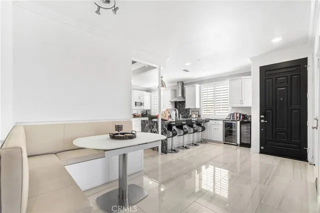 a living room with furniture fireplace and a flat screen tv