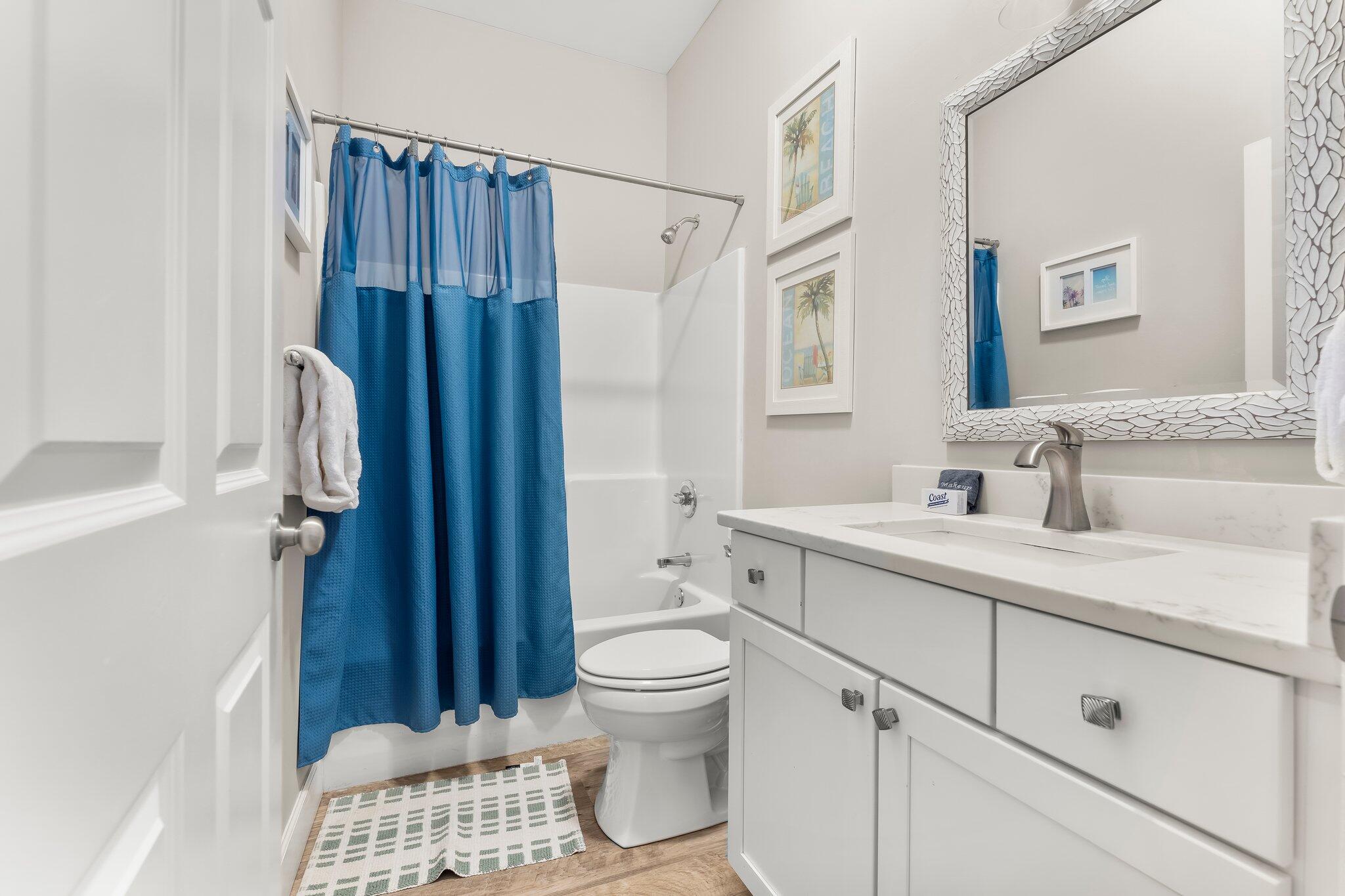 231 Somerset Bridge Road, Unit 2209 Santa Rosa Beach, FL 32459 - Photo 16 of 30 a bathroom with a sink toilet a shower and a mirror