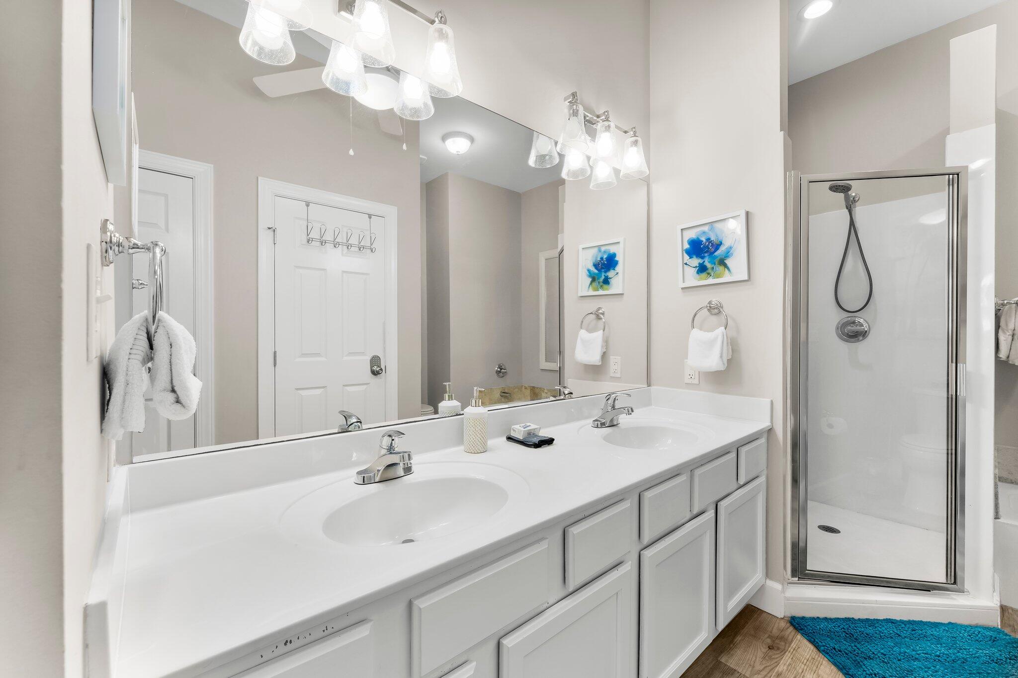 231 Somerset Bridge Road, Unit 2209 Santa Rosa Beach, FL 32459 - Photo 19 of 30 a bathroom with a sink double vanity and a mirror