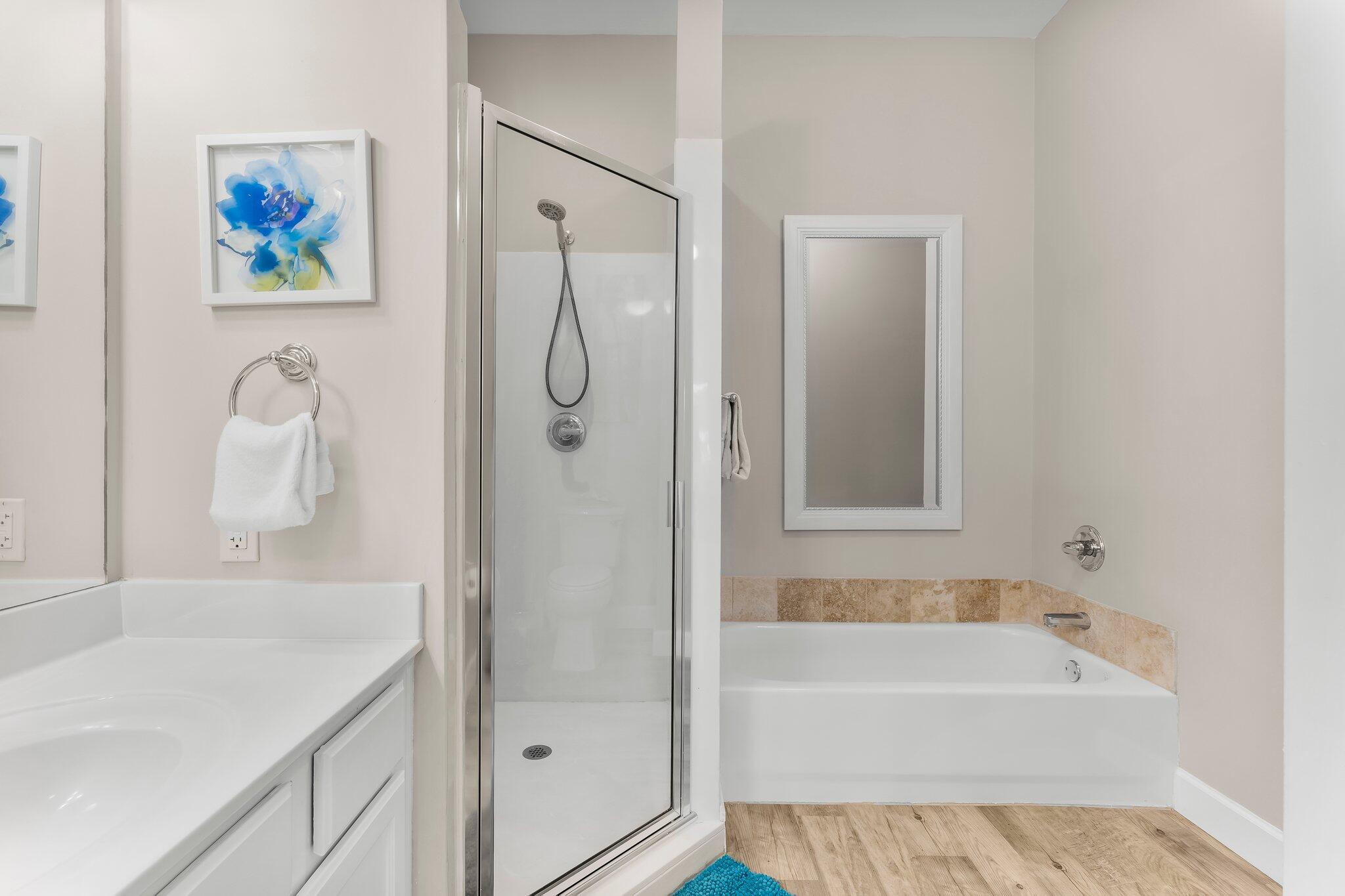 231 Somerset Bridge Road, Unit 2209 Santa Rosa Beach, FL 32459 - Photo 20 of 30 a bathroom with a granite countertop tub a sink and a shower