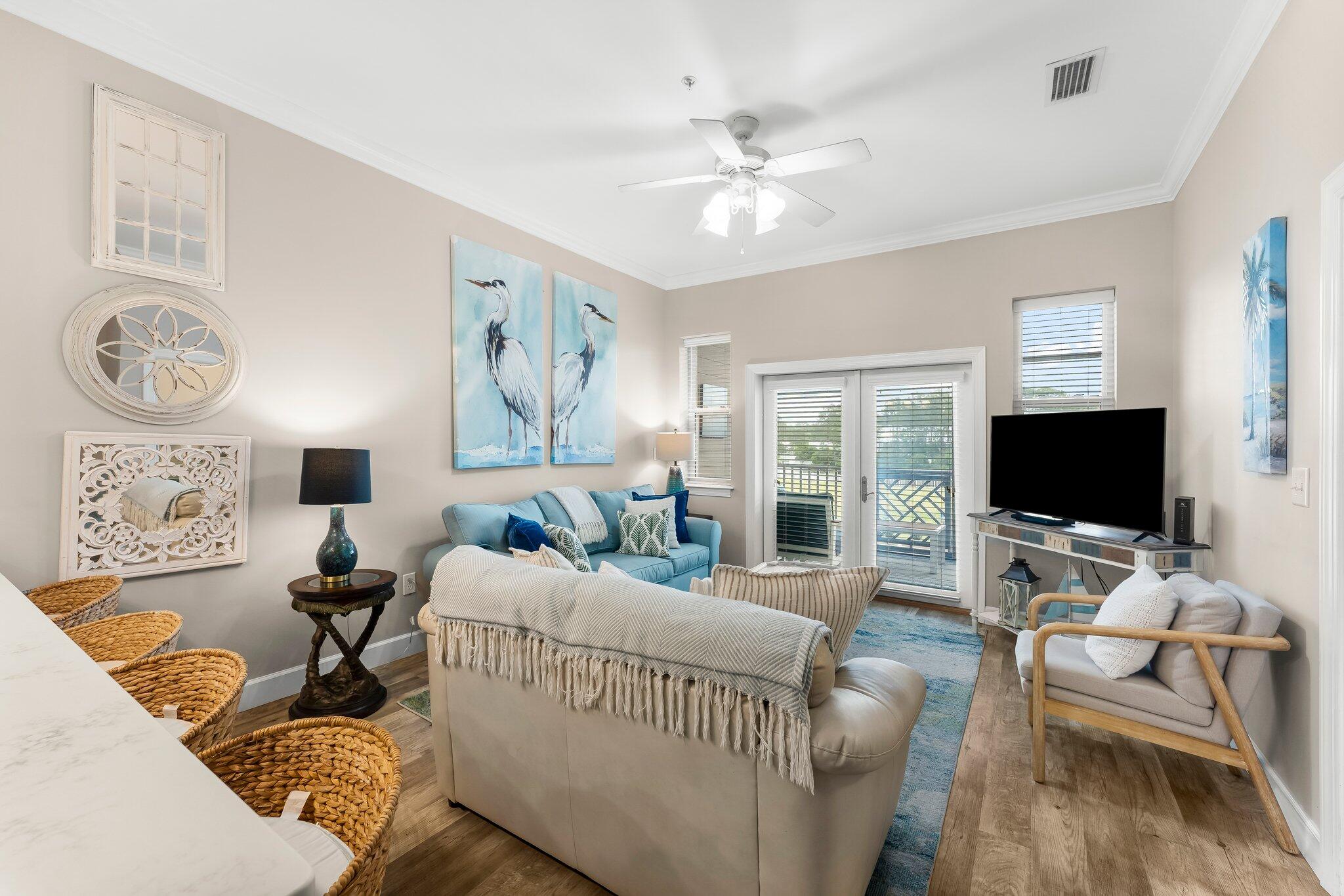 231 Somerset Bridge Road, Unit 2209 Santa Rosa Beach, FL 32459 - Photo 2 of 30 a living room with furniture and a flat screen tv